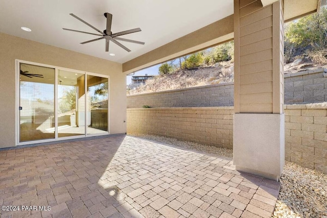 view of patio featuring ceiling fan