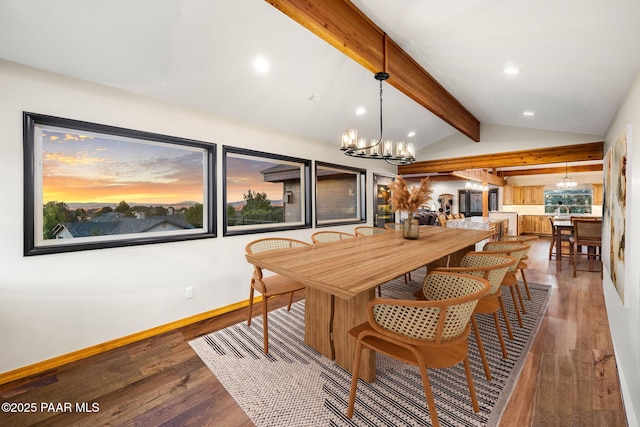 dining area featuring hardwood / wood-style floors, an inviting chandelier, and lofted ceiling with beams