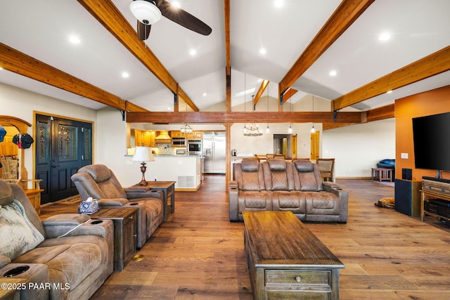 living room with hardwood / wood-style flooring, lofted ceiling with beams, and ceiling fan