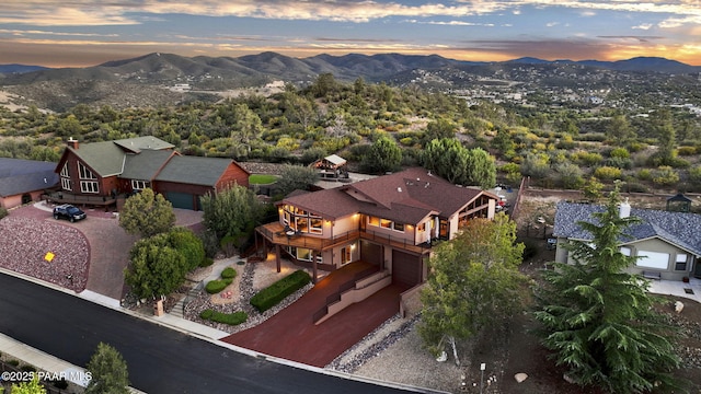 aerial view at dusk with a mountain view