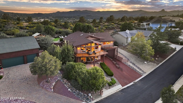 aerial view at dusk with a mountain view