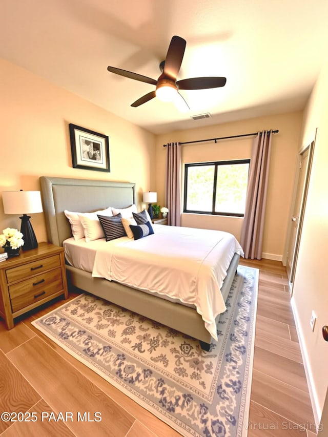 7010 N Race Track Rd, Prescott, AZ 86305 - bedroom featuring light wood finished floors and a ceiling fan