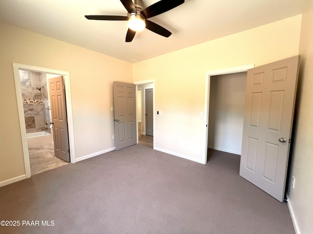 7010 N Race Track Rd, Prescott, AZ 86305 - unfurnished bedroom with carpet flooring, ensuite bathroom, and a ceiling fan