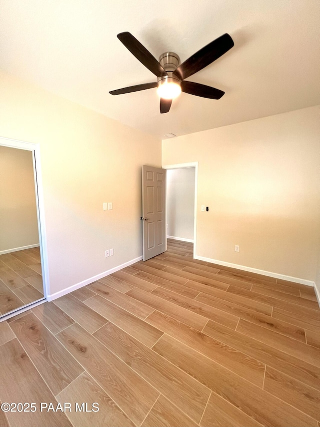7010 N Race Track Rd, Prescott, AZ 86305 - unfurnished bedroom featuring light wood finished floors and ceiling fan