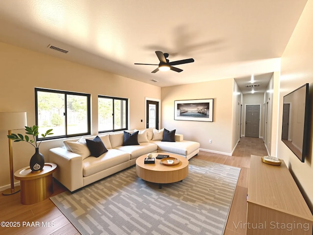 7010 N Race Track Rd, Prescott, AZ 86305 - living room with light wood-style flooring and ceiling fan