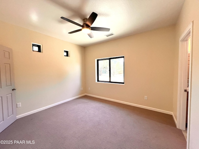7010 N Race Track Rd, Prescott, AZ 86305 - empty room with a ceiling fan and dark carpet