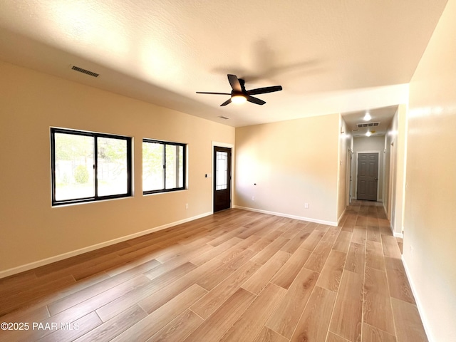 7010 N Race Track Rd, Prescott, AZ 86305 - empty room with light wood-style floors and a ceiling fan