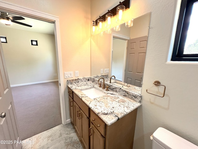 7010 N Race Track Rd, Prescott, AZ 86305 - bathroom featuring vanity, ceiling fan, and stone finish flooring