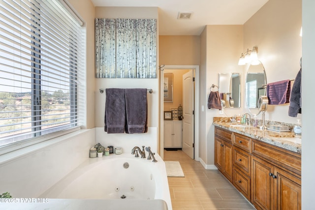 4995 Cactus Pl, Prescott, AZ 86301 - bathroom featuring double vanity and a jetted tub