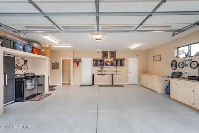 4995 Cactus Pl, Prescott, AZ 86301 - garage featuring separate washer and dryer and a garage door opener
