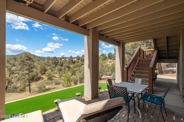 4995 Cactus Pl, Prescott, AZ 86301 - view of patio / terrace with outdoor dining space, stairs, and a mountain view