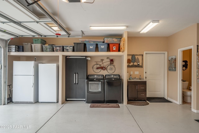 4995 Cactus Pl, Prescott, AZ 86301 - garage featuring freestanding refrigerator and washer and dryer