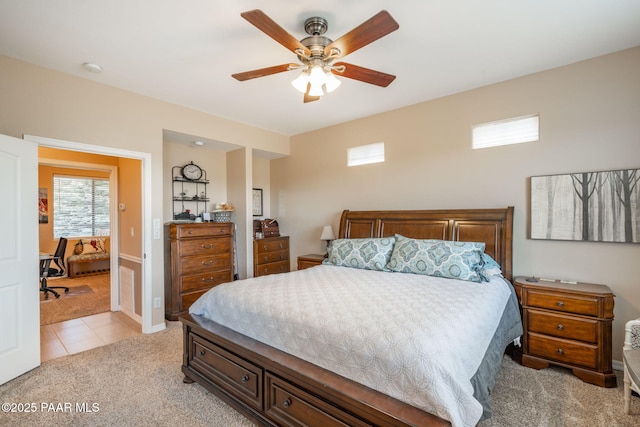 4995 Cactus Pl, Prescott, AZ 86301 - bedroom with light carpet, a ceiling fan, and light tile patterned floors