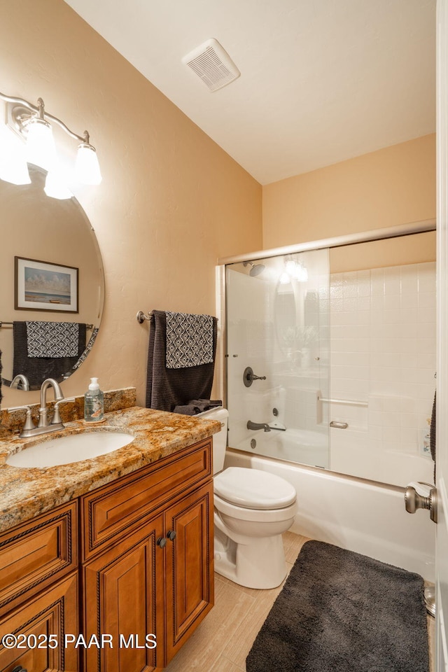 4995 Cactus Pl, Prescott, AZ 86301 - bathroom with vanity, toilet, and enclosed tub / shower combo