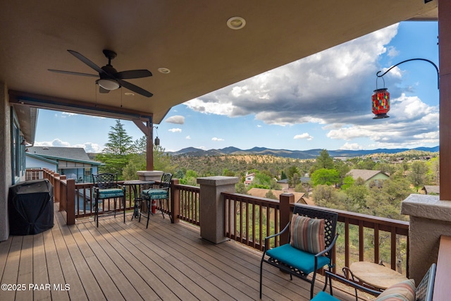 4995 Cactus Pl, Prescott, AZ 86301 - wooden deck featuring a mountain view, a ceiling fan, and area for grilling