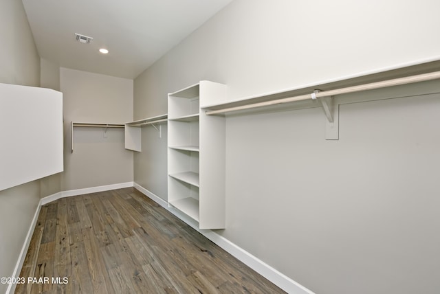 12214 N Petra Cir, Prescott, AZ 86305 - spacious closet featuring dark wood-style flooring
