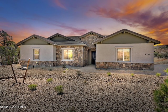 12214 N Petra Cir, Prescott, AZ 86305 - view of front facade with stone siding, a tile roof, and stucco siding