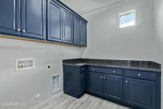 clothes washing area with gas dryer hookup, cabinets, hookup for a washing machine, light hardwood / wood-style flooring, and hookup for an electric dryer