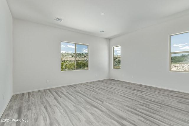 empty room with light wood-type flooring