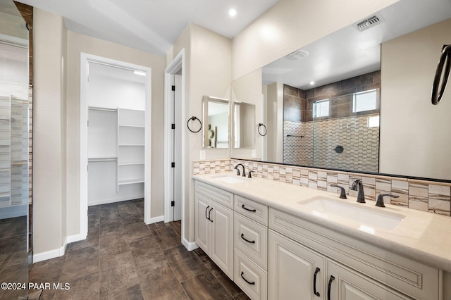 bathroom with tasteful backsplash, a shower with door, vanity, and hardwood / wood-style flooring