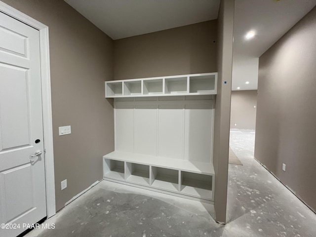 mudroom featuring concrete floors