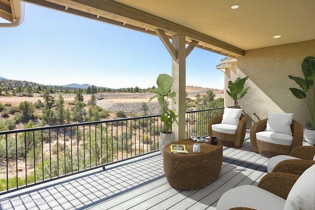 balcony featuring a mountain view