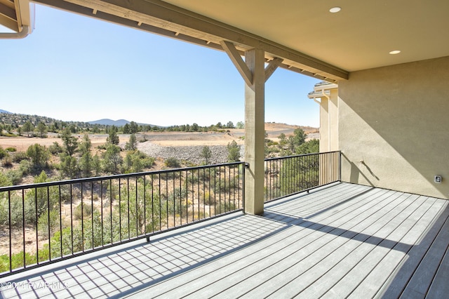 balcony featuring a mountain view