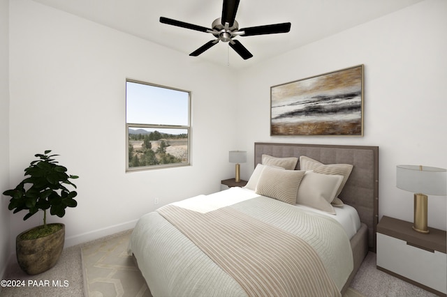 bedroom with baseboards, ceiling fan, and carpet
