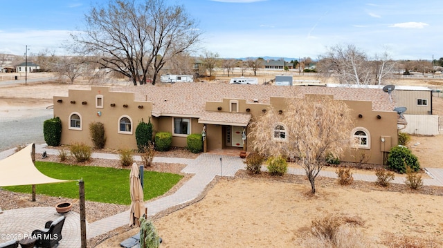 view of front facade featuring stucco siding