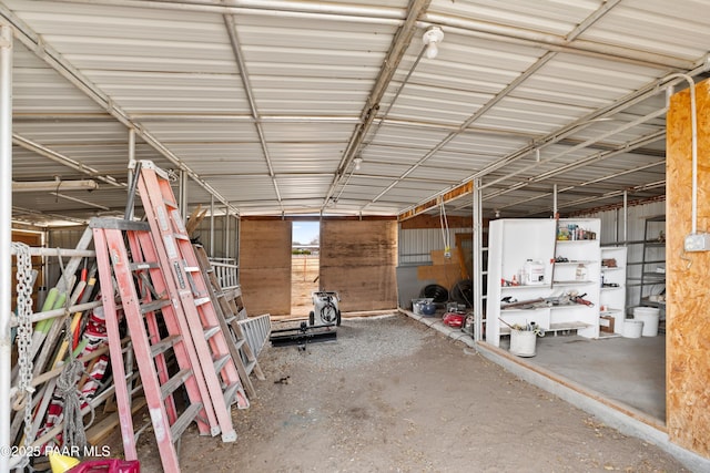 garage featuring metal wall