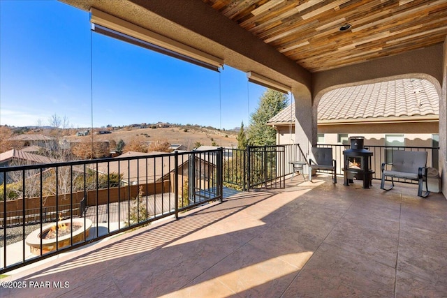 view of patio with a balcony