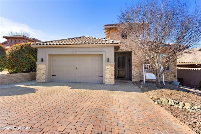 view of front of property featuring a garage