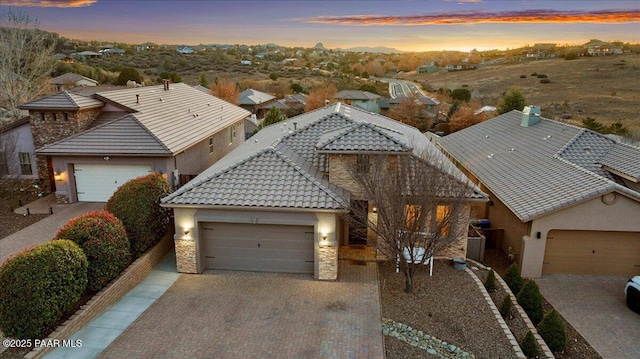 view of front of property featuring a garage