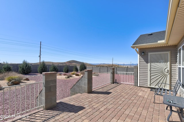 view of patio with fence