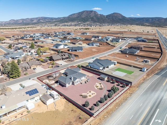 aerial view featuring a mountain view and a residential view