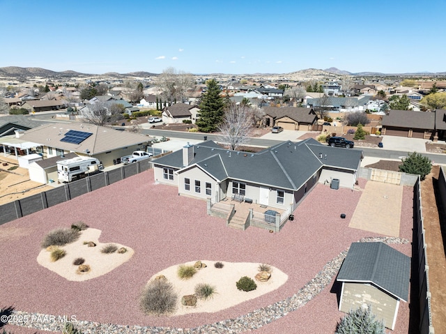 bird's eye view with a mountain view and a residential view