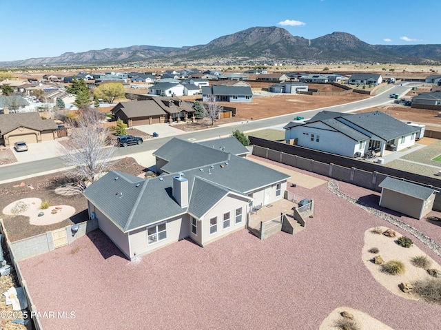 aerial view with a mountain view and a residential view