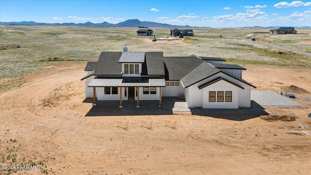 view of front of home with a mountain view