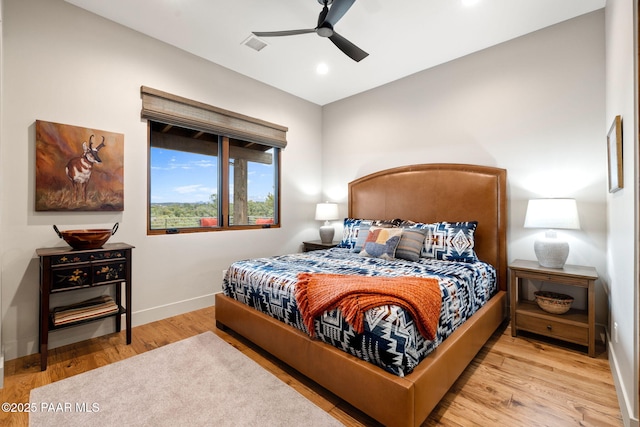 bedroom with wood finished floors, visible vents, baseboards, recessed lighting, and ceiling fan