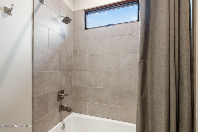 full bath with shower / bathtub combination with curtain