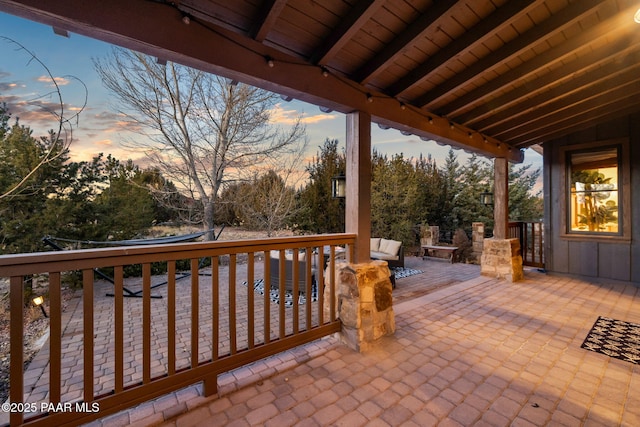 view of patio terrace at dusk