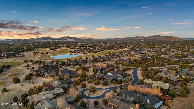 aerial view at dusk with a mountain view