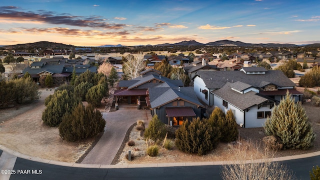 aerial view at dusk with a mountain view