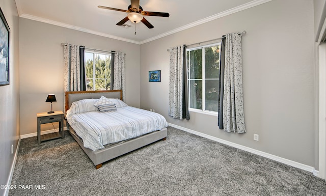 bedroom featuring dark carpet, ceiling fan, and ornamental molding