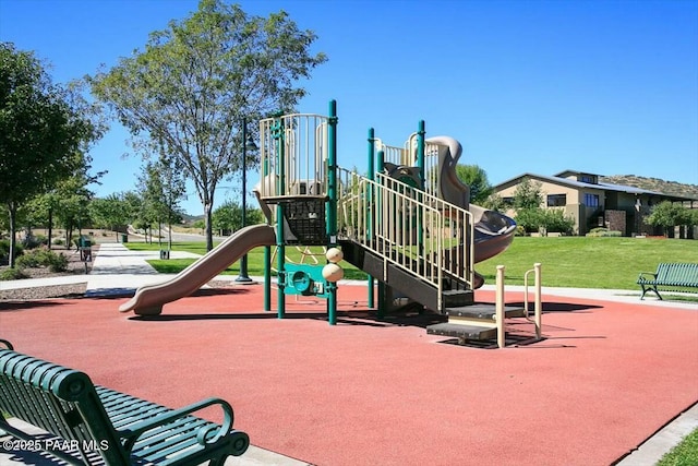 view of playground with a yard