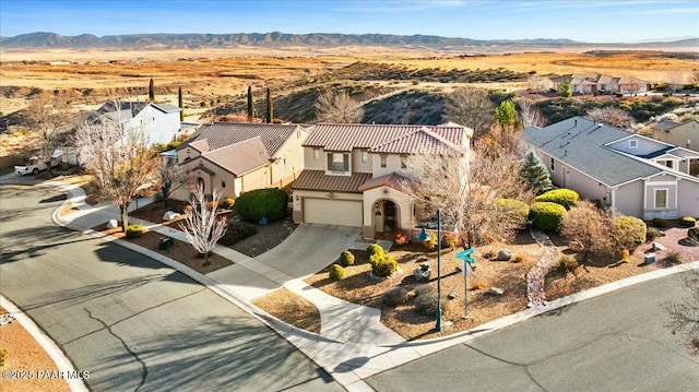 bird's eye view with a mountain view