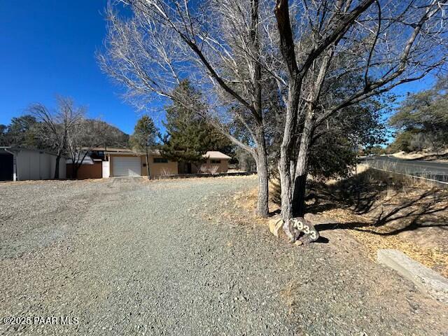 view of yard with a garage