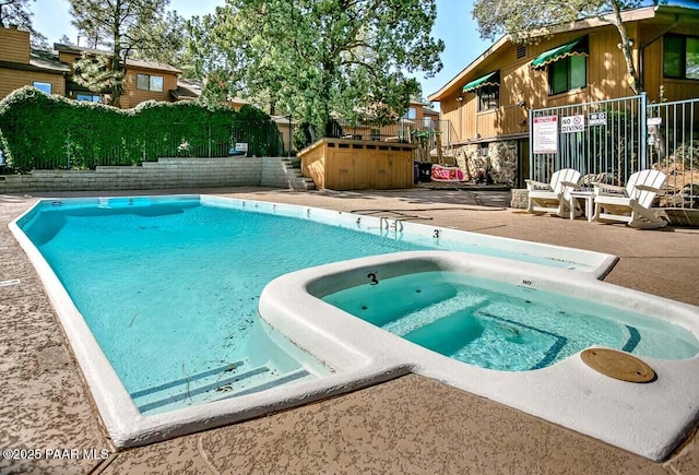 237 Creekside Cir Unit C, Prescott, AZ 86303 - view of swimming pool with a pool with connected hot tub and a patio area