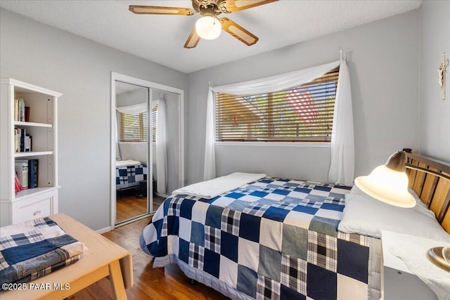 1819 Mountain View Ln, Prescott, AZ 86301 - bedroom featuring wood finished floors, a closet, and a ceiling fan