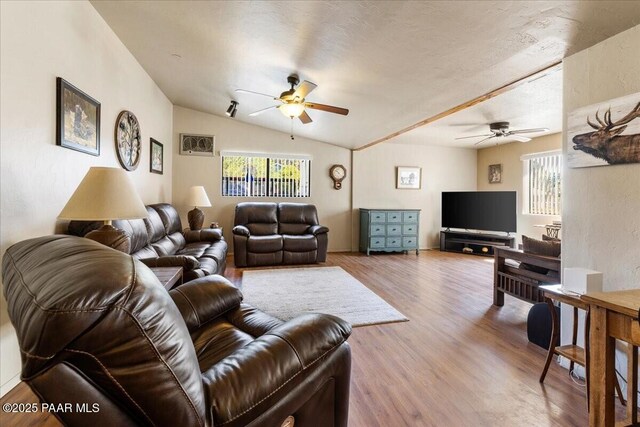 1819 Mountain View Ln, Prescott, AZ 86301 - living room featuring ceiling fan, plenty of natural light, wood finished floors, and vaulted ceiling